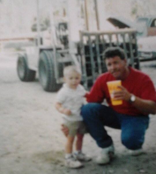 dillon working with his dad on Forklift